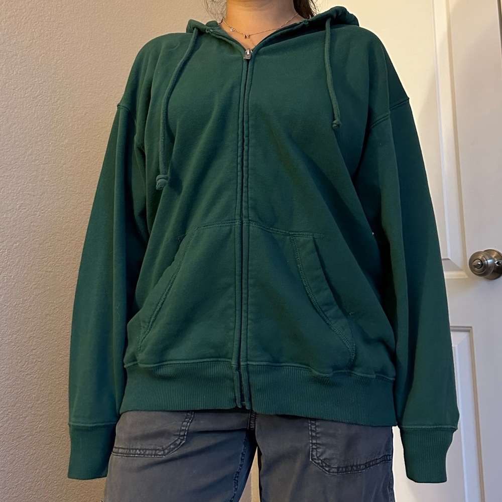green zip up hoodie